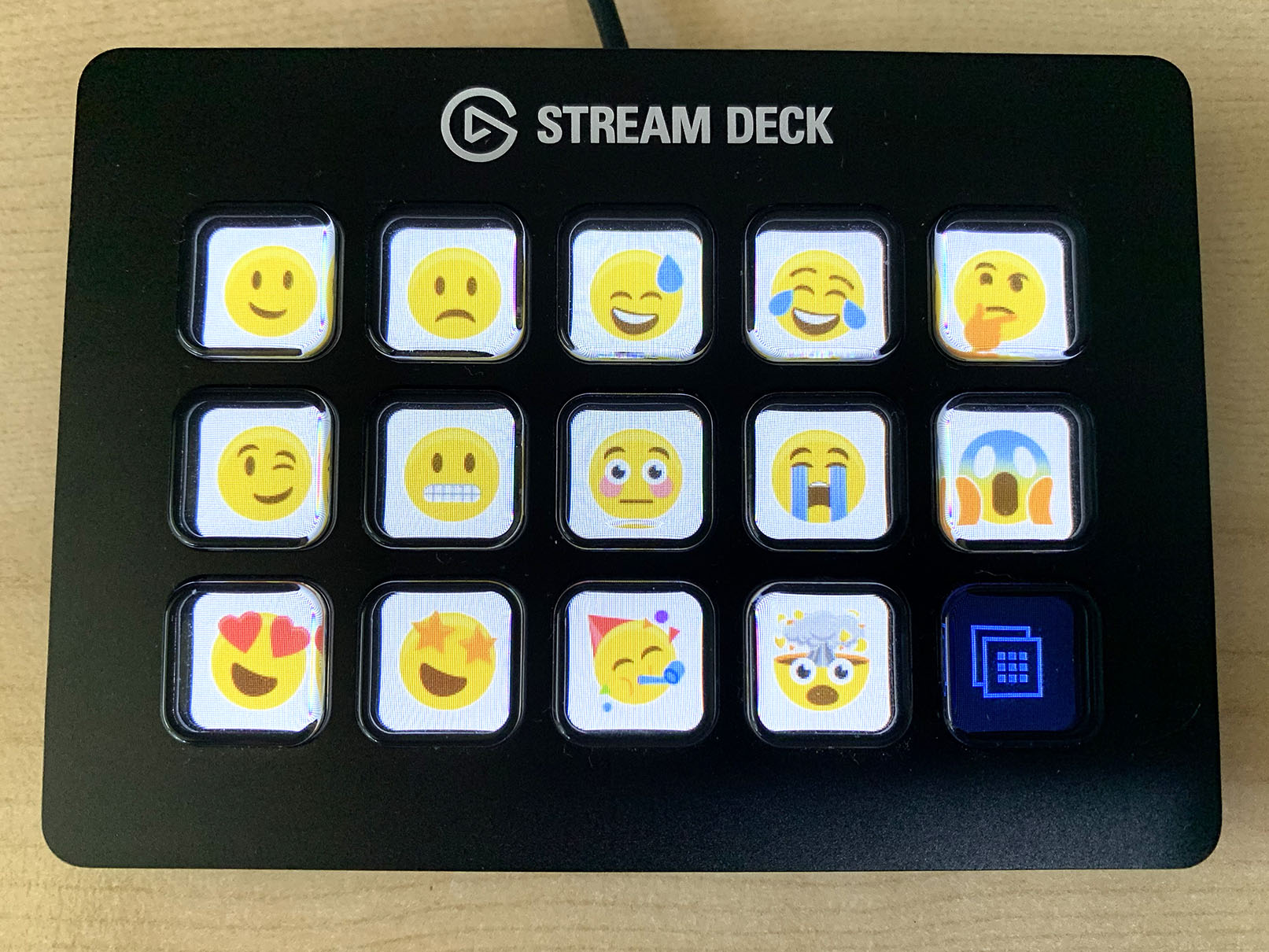 A Stream Deck showing a set of Emoji icons
