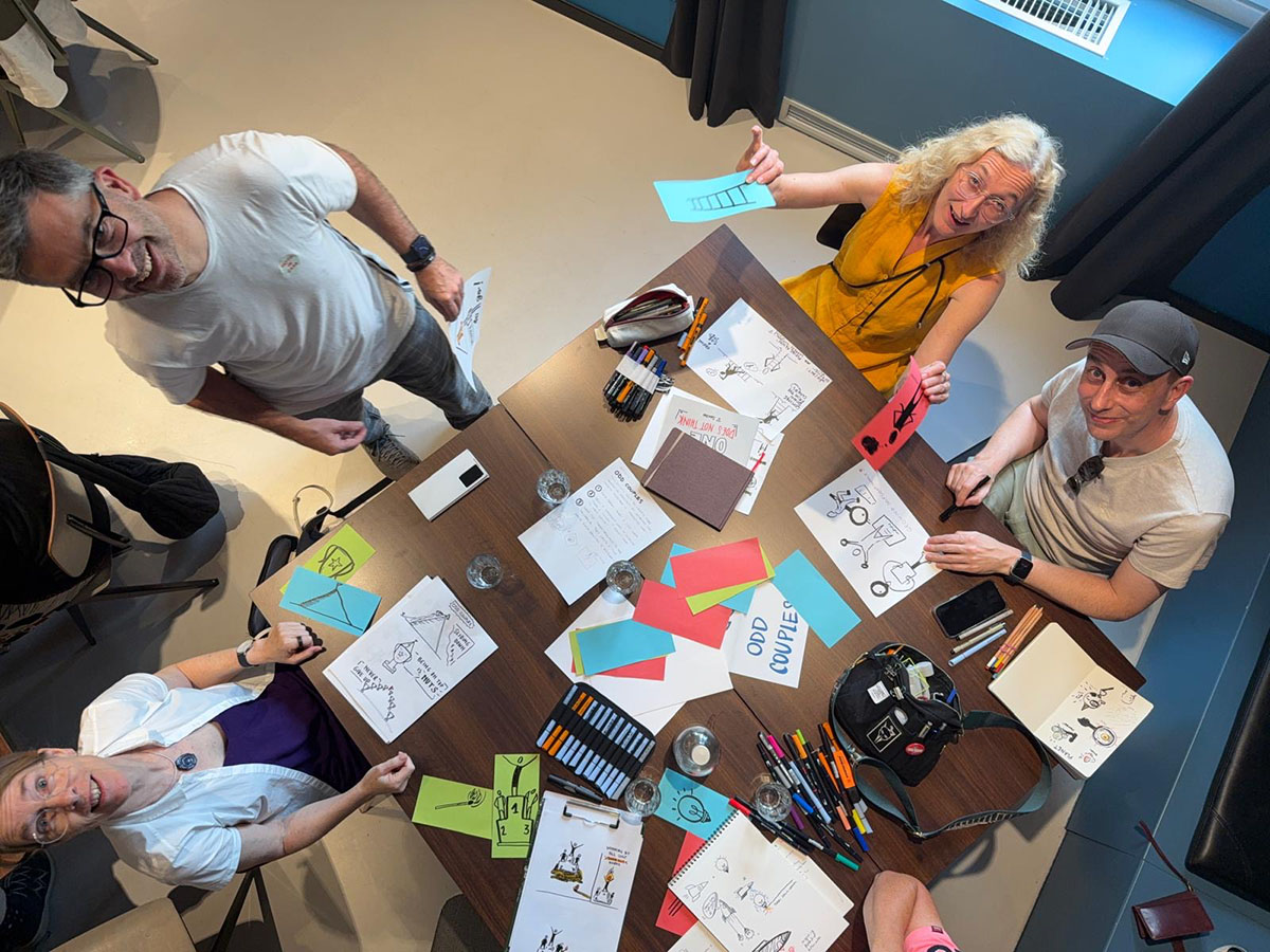 A photo taken overhead of a group of attendees in our workshop